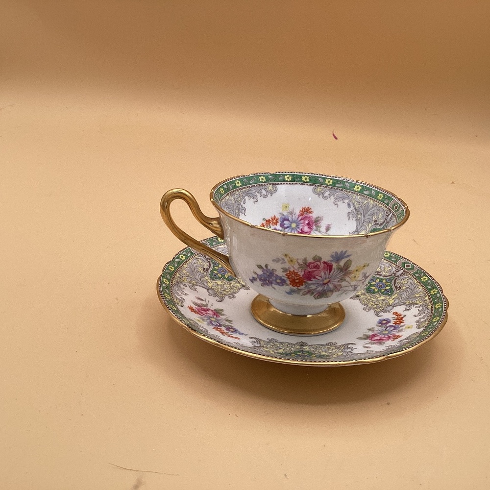 This is a Shelley fine bone China, teacup, and saucer in the Georgian pattern